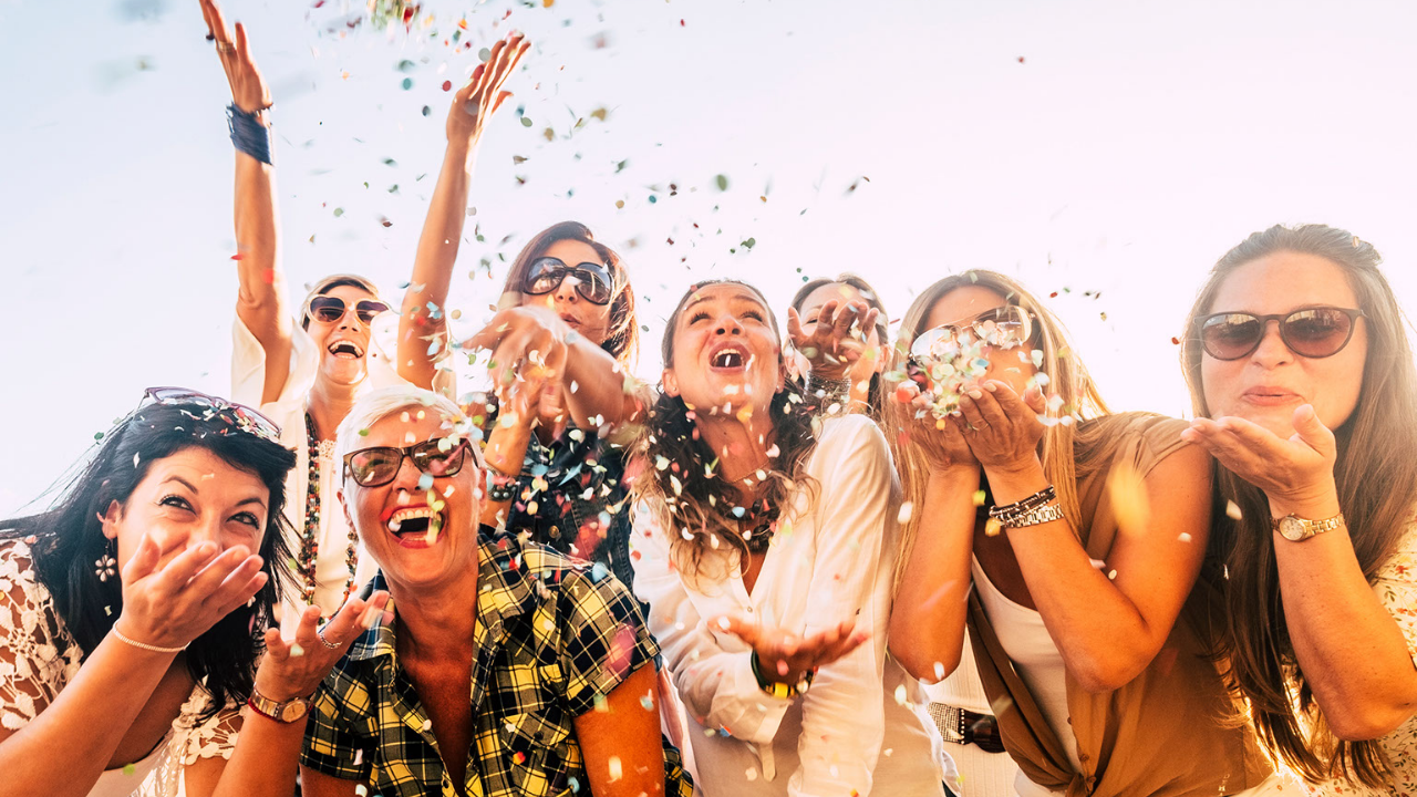 photo of women celebrating